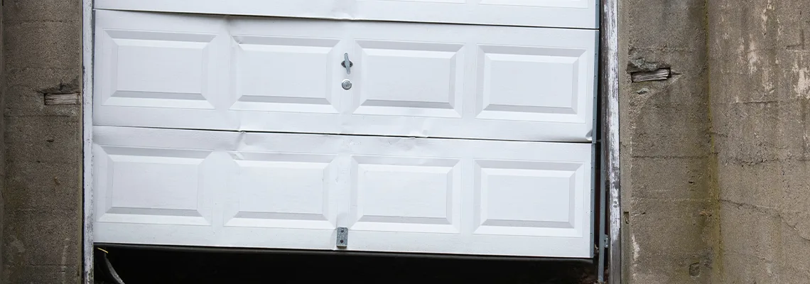 Garage Door Got Hit By A Car Dent Removal in Daytona Beach, FL