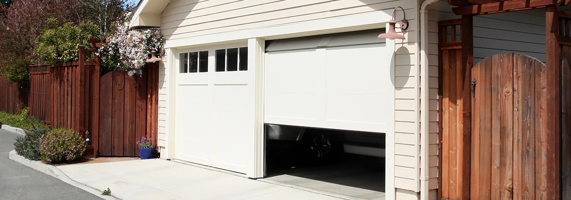 Fix Metal Garage Door Jerking in Daytona Beach, Florida